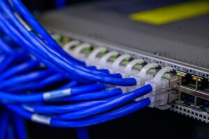 Network switch with blue cables going into it