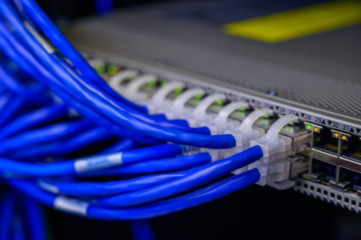 Network switch with blue cables going into it