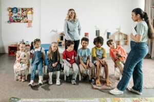 Group of young students and teachers