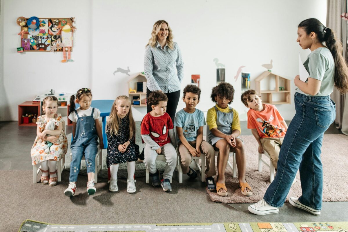 Group of young students and teachers